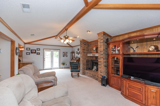 7919 Mitcham Dr, Amarillo, TX 79121 - carpeted living area featuring ceiling fan, a brick fireplace, crown molding, and a textured ceiling