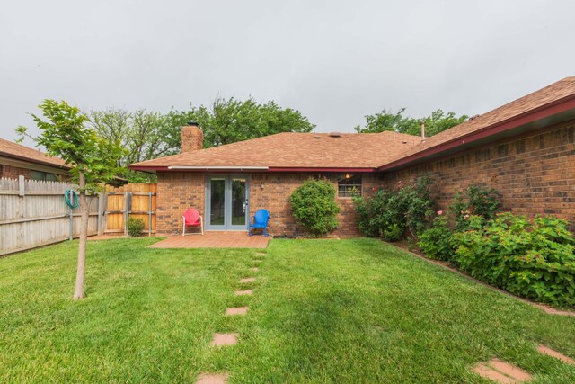 7919 Mitcham Dr, Amarillo, TX 79121 - view of yard with french doors