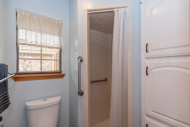 7919 Mitcham Dr, Amarillo, TX 79121 - bathroom featuring a stall shower and toilet