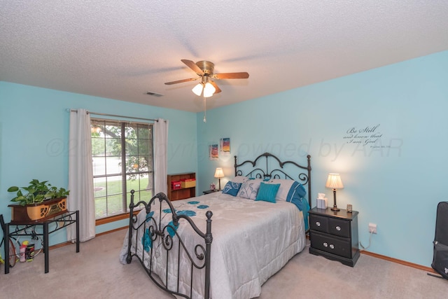 7919 Mitcham Dr, Amarillo, TX 79121 - bedroom featuring light carpet, a textured ceiling, and ceiling fan