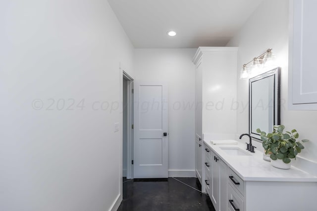 bathroom with vanity and concrete floors