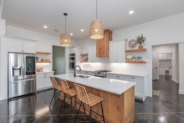 kitchen with white cabinets, sink, and stainless steel appliances