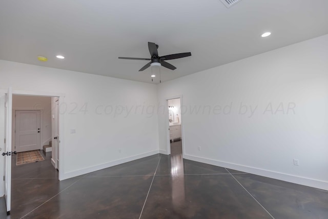 unfurnished room with ceiling fan