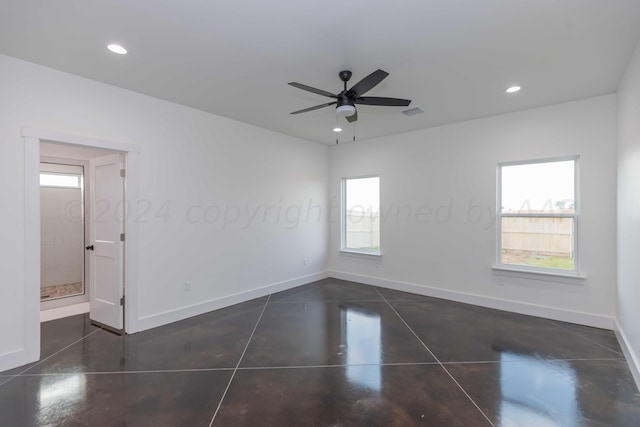 unfurnished room with ceiling fan