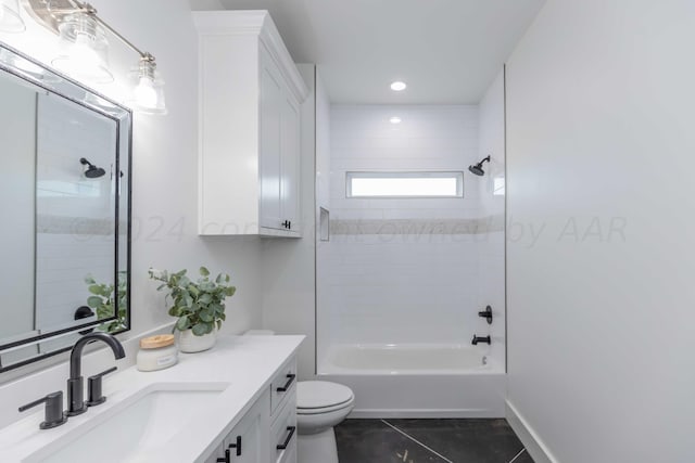 full bathroom with vanity, tiled shower / bath, tile patterned floors, and toilet