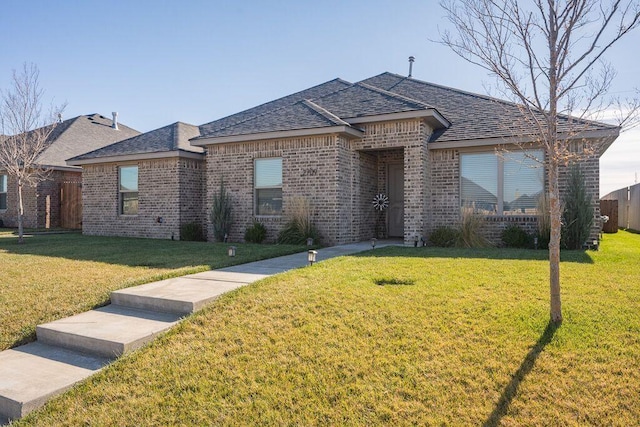 single story home featuring a front yard