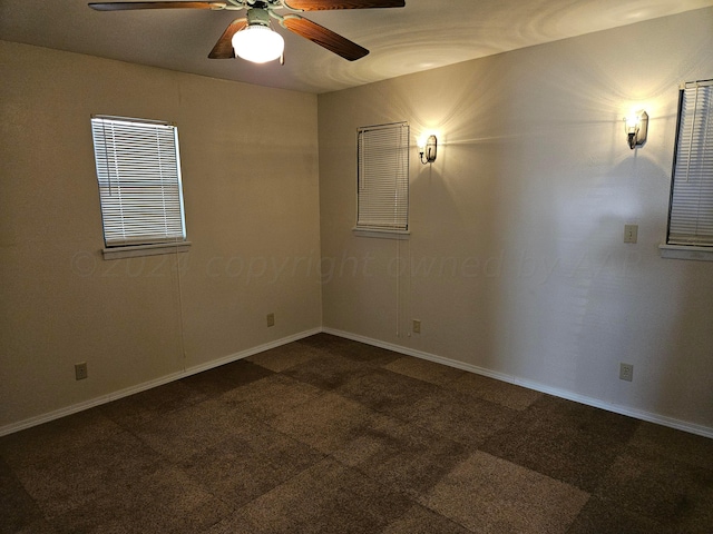 spare room featuring ceiling fan