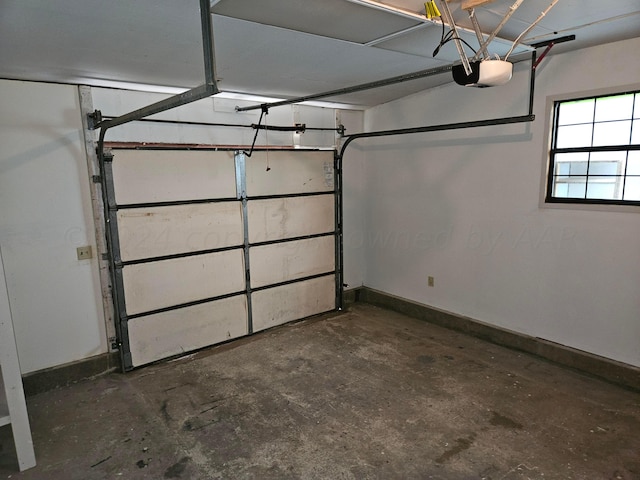 garage featuring a garage door opener