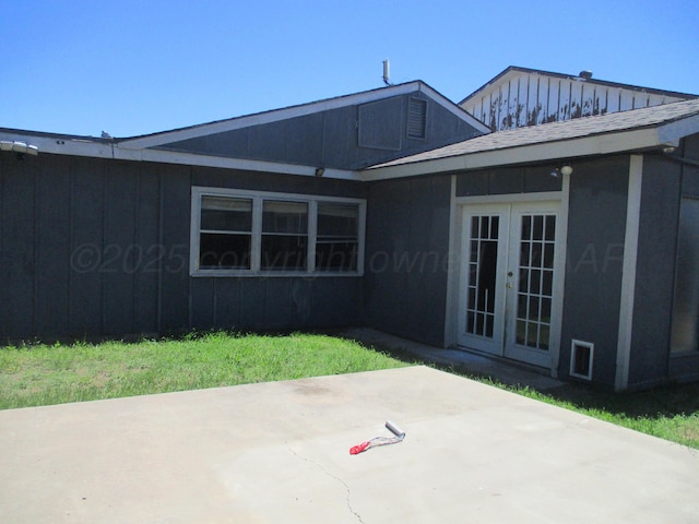1502 Lancelot St, Borger, TX 79007 - back of house featuring french doors and a patio