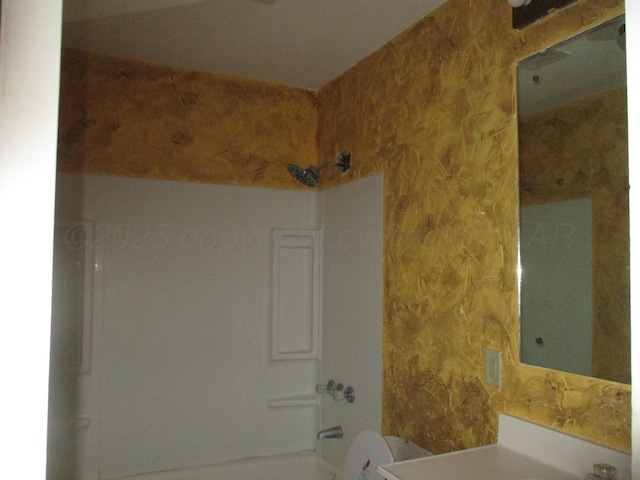 1502 Lancelot St, Borger, TX 79007 - bathroom with toilet, bathtub / shower combination, wallpapered walls, and vanity