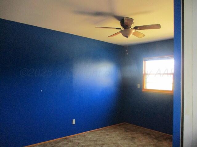 1502 Lancelot St, Borger, TX 79007 - carpeted empty room featuring ceiling fan and baseboards