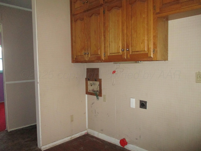 1502 Lancelot St, Borger, TX 79007 - washroom featuring hookup for an electric dryer, cabinet space, and baseboards