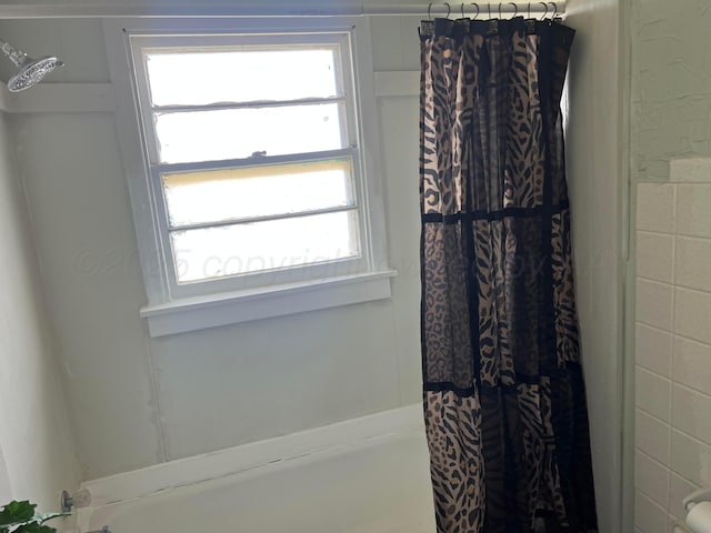 106 Peiffer St, Borger, TX 79007 - bathroom with a shower with shower curtain