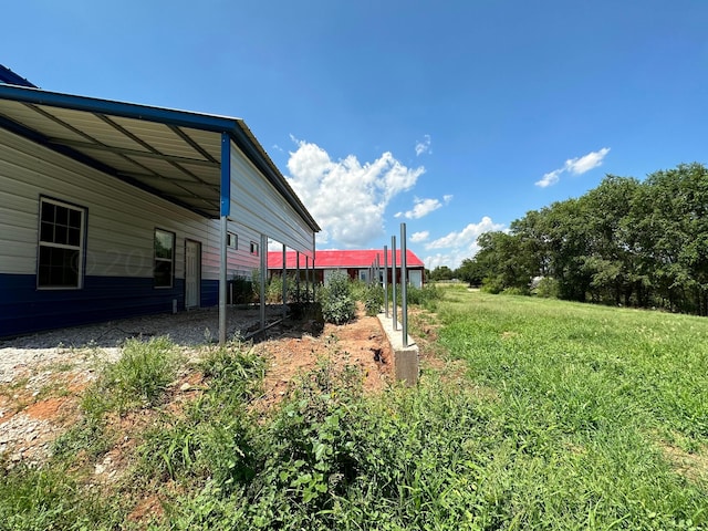 700 N Texas St, Shamrock, TX 79079 - view of yard with a carport