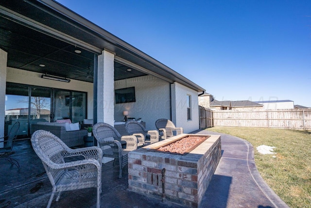 9111 Highland Springs Dr, Amarillo, TX 79119 - view of patio / terrace featuring fence and a fire pit