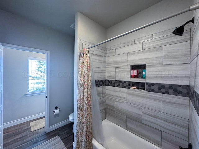 9111 Highland Springs Dr, Amarillo, TX 79119 - full bath featuring shower / bath combo with shower curtain, baseboards, wood finished floors, and toilet