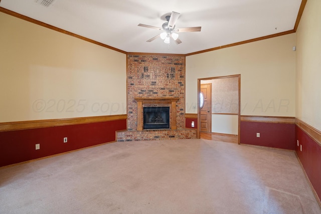 6701 Admiral Ct, Amarillo, TX 79124 - unfurnished living room with carpet floors, a ceiling fan, wainscoting, ornamental molding, and a fireplace