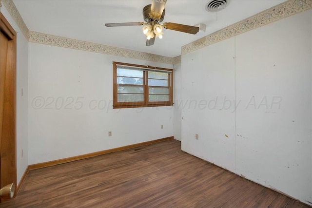 unfurnished bedroom with ceiling fan and dark hardwood / wood-style floors