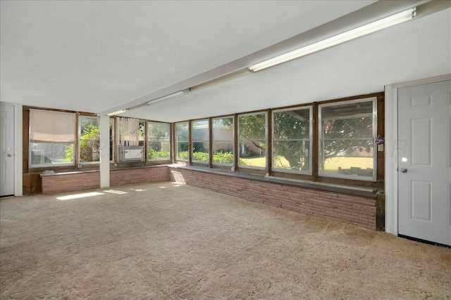 unfurnished sunroom with cooling unit