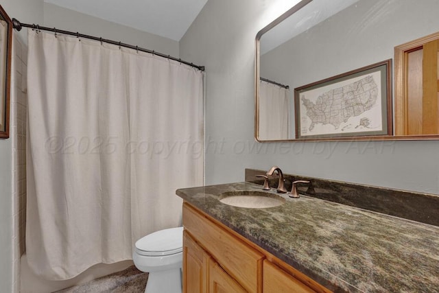 bathroom featuring vanity, toilet, and shower / tub combo with curtain