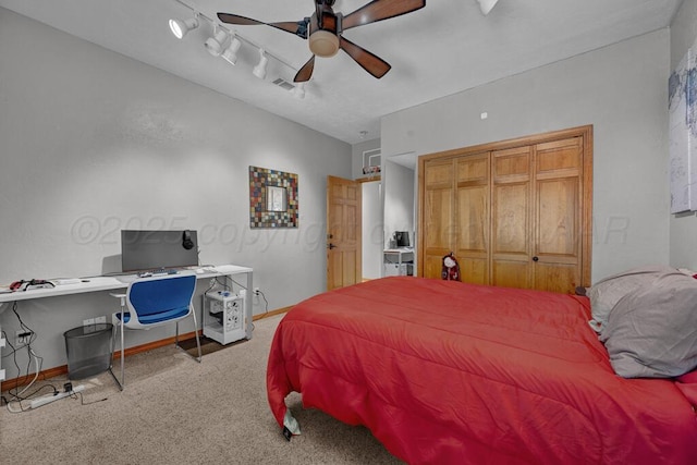 carpeted bedroom featuring visible vents, a closet, a ceiling fan, and baseboards