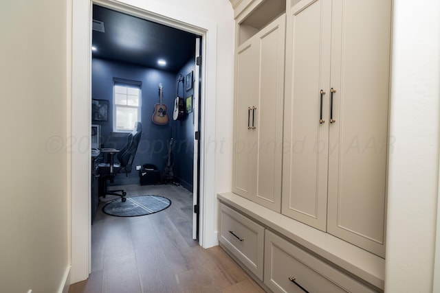 mudroom with light wood-type flooring