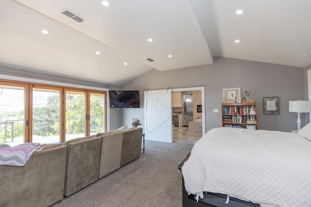 2 Altamira St, Borger, TX 79007 - bedroom with lofted ceiling, light carpet, recessed lighting, ensuite bathroom, and a barn door