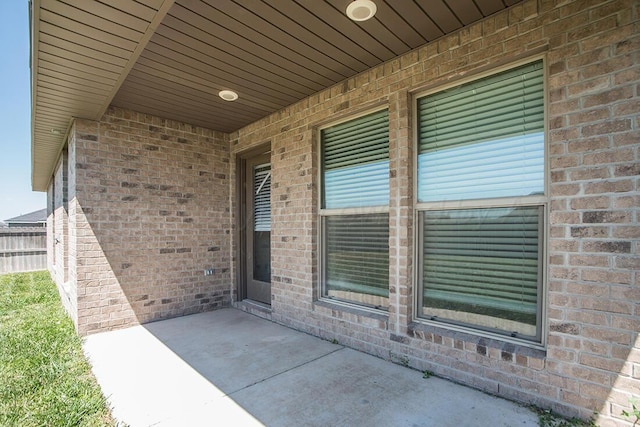 7200 Athens St, Amarillo, TX 79118 - entrance to property featuring a patio area and brick siding
