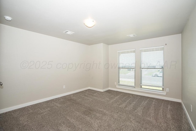 7200 Athens St, Amarillo, TX 79118 - spare room with dark carpet and a smoke detector