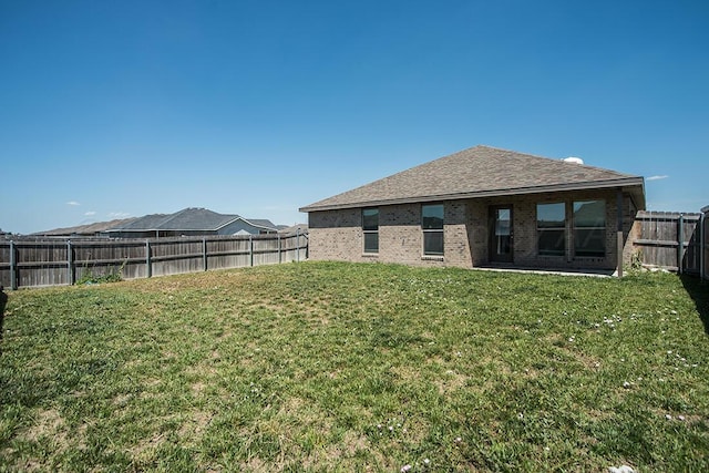 7200 Athens St, Amarillo, TX 79118 - back of house featuring a fenced backyard and brick siding
