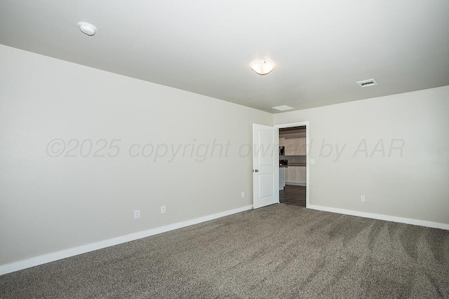 7200 Athens St, Amarillo, TX 79118 - spare room with dark colored carpet and baseboards