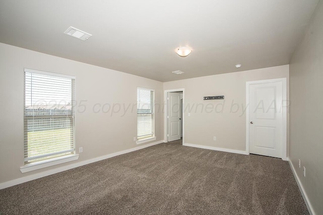 7200 Athens St, Amarillo, TX 79118 - empty room featuring dark carpet