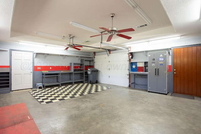 103 N Timbercreek Dr, Amarillo, TX 79118 - garage featuring a ceiling fan and visible vents