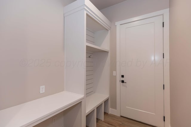 mudroom with light wood-style flooring