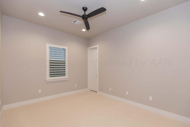 empty room with ceiling fan, light carpet, recessed lighting, and visible vents
