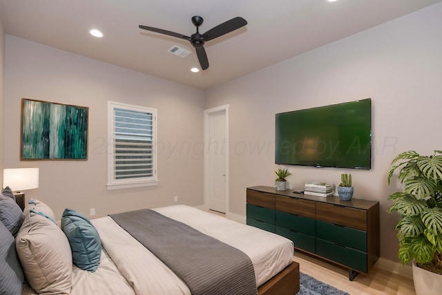 bedroom featuring visible vents, recessed lighting, light wood finished floors, and a ceiling fan