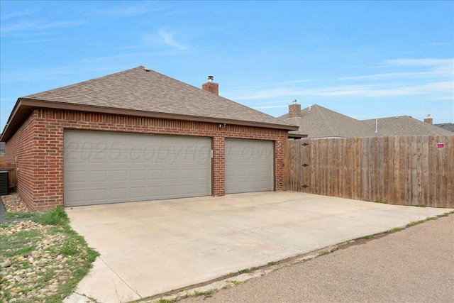 9109 Staten Island St, Amarillo, TX 79119 - garage featuring driveway