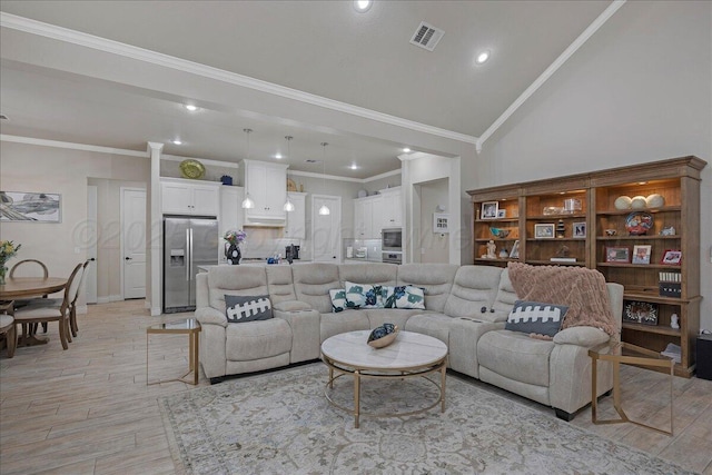 9109 Staten Island St, Amarillo, TX 79119 - living room with ornamental molding, recessed lighting, light wood-style floors, and high vaulted ceiling