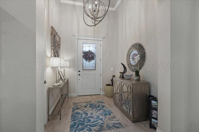9109 Staten Island St, Amarillo, TX 79119 - entryway with a chandelier, wood finished floors, and a textured wall