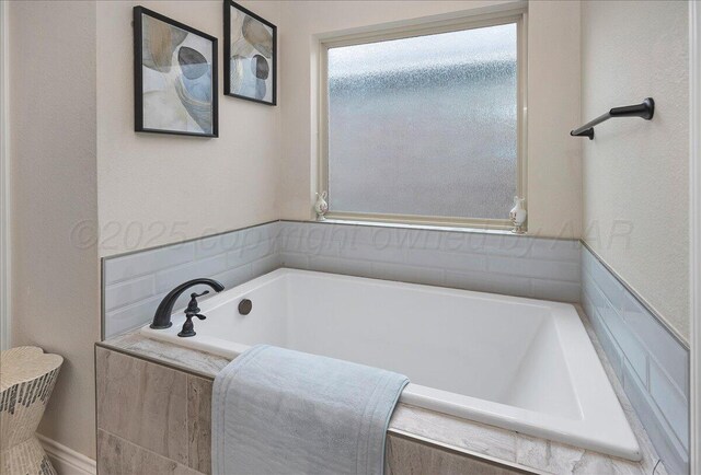 9109 Staten Island St, Amarillo, TX 79119 - bathroom featuring a garden tub