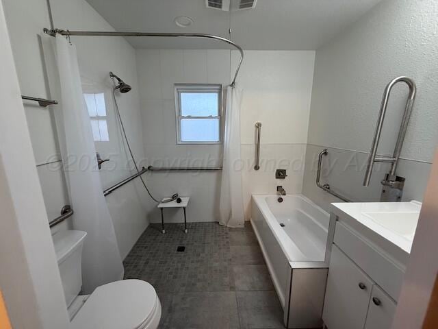 bathroom with shower / bath combo, vanity, and toilet