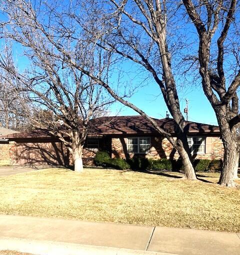 exterior space featuring a front lawn