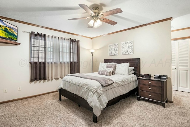bedroom with light colored carpet, crown molding, ceiling fan, and baseboards