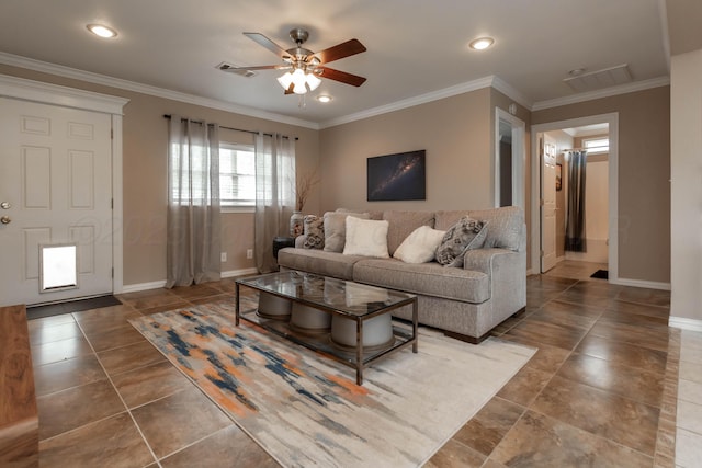 1107 Yucca Ave, Amarillo, TX 79108 - living area featuring ceiling fan, baseboards, tile patterned floors, ornamental molding, and recessed lighting