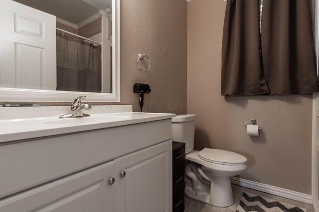 1107 Yucca Ave, Amarillo, TX 79108 - bathroom featuring crown molding, toilet, vanity, and baseboards