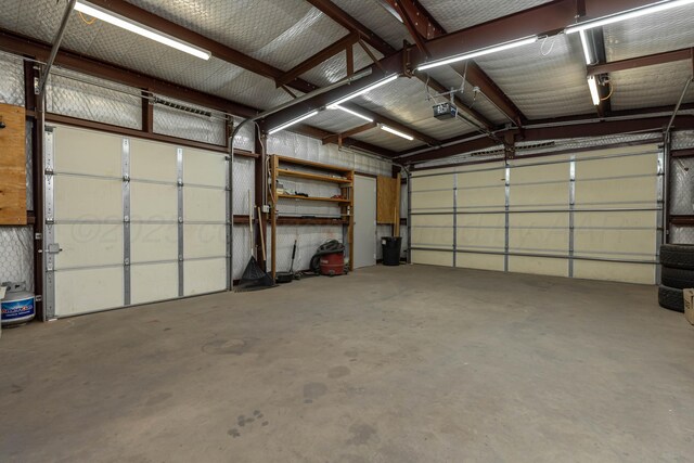 1107 Yucca Ave, Amarillo, TX 79108 - garage featuring a garage door opener