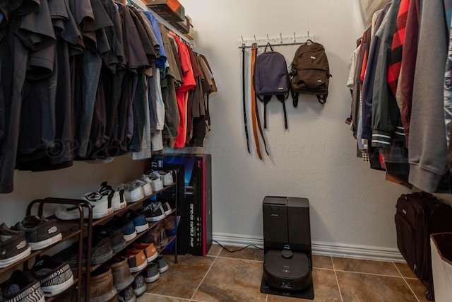 1107 Yucca Ave, Amarillo, TX 79108 - walk in closet with tile patterned flooring