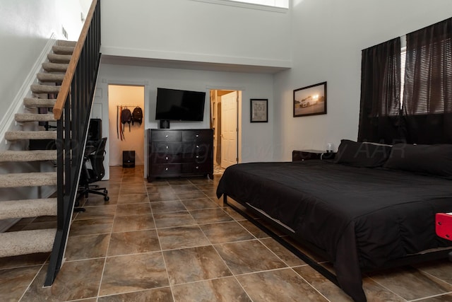1107 Yucca Ave, Amarillo, TX 79108 - bedroom with a walk in closet and a towering ceiling