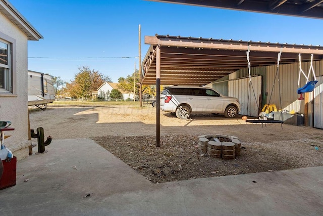 exterior space with a fire pit