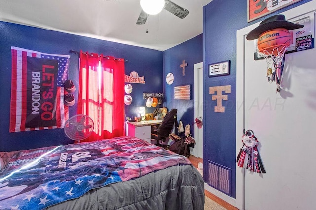 bedroom with visible vents and a ceiling fan